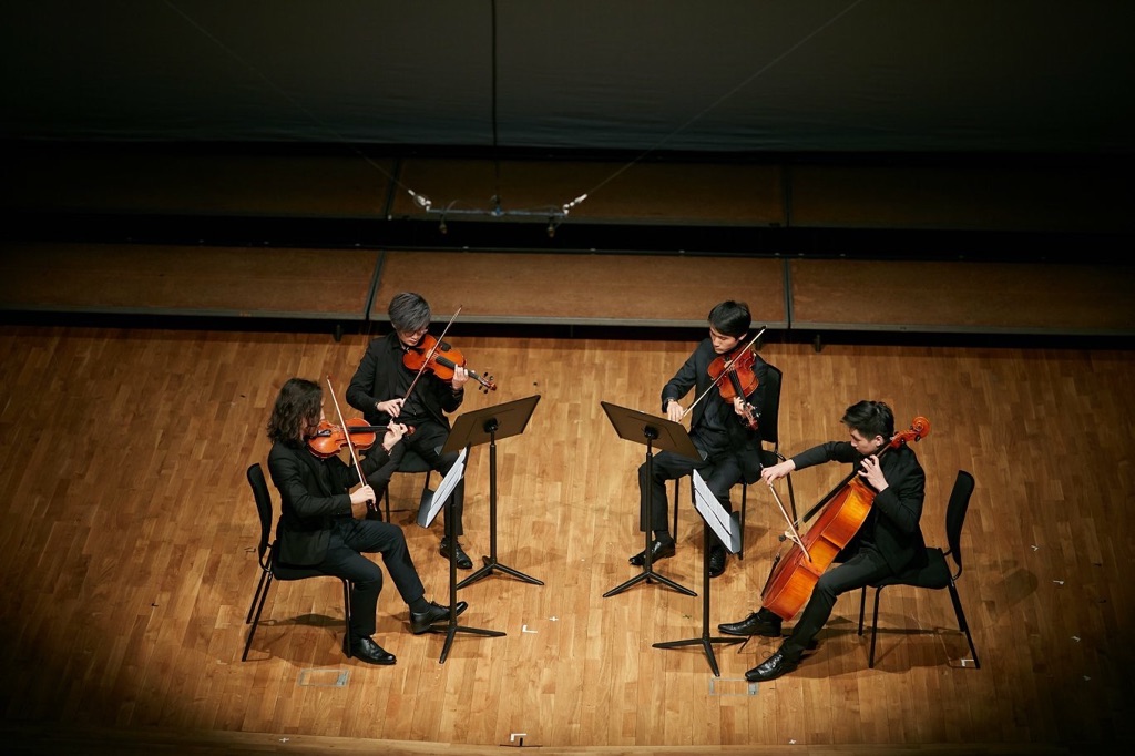 Yim (second left), performing Zhou Long’s string quartet with his colleagues at the Hong Kong City Hall. 