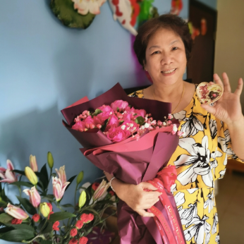 梁女士